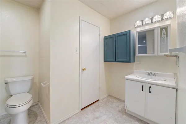 a kitchen with sink cabinets and window
