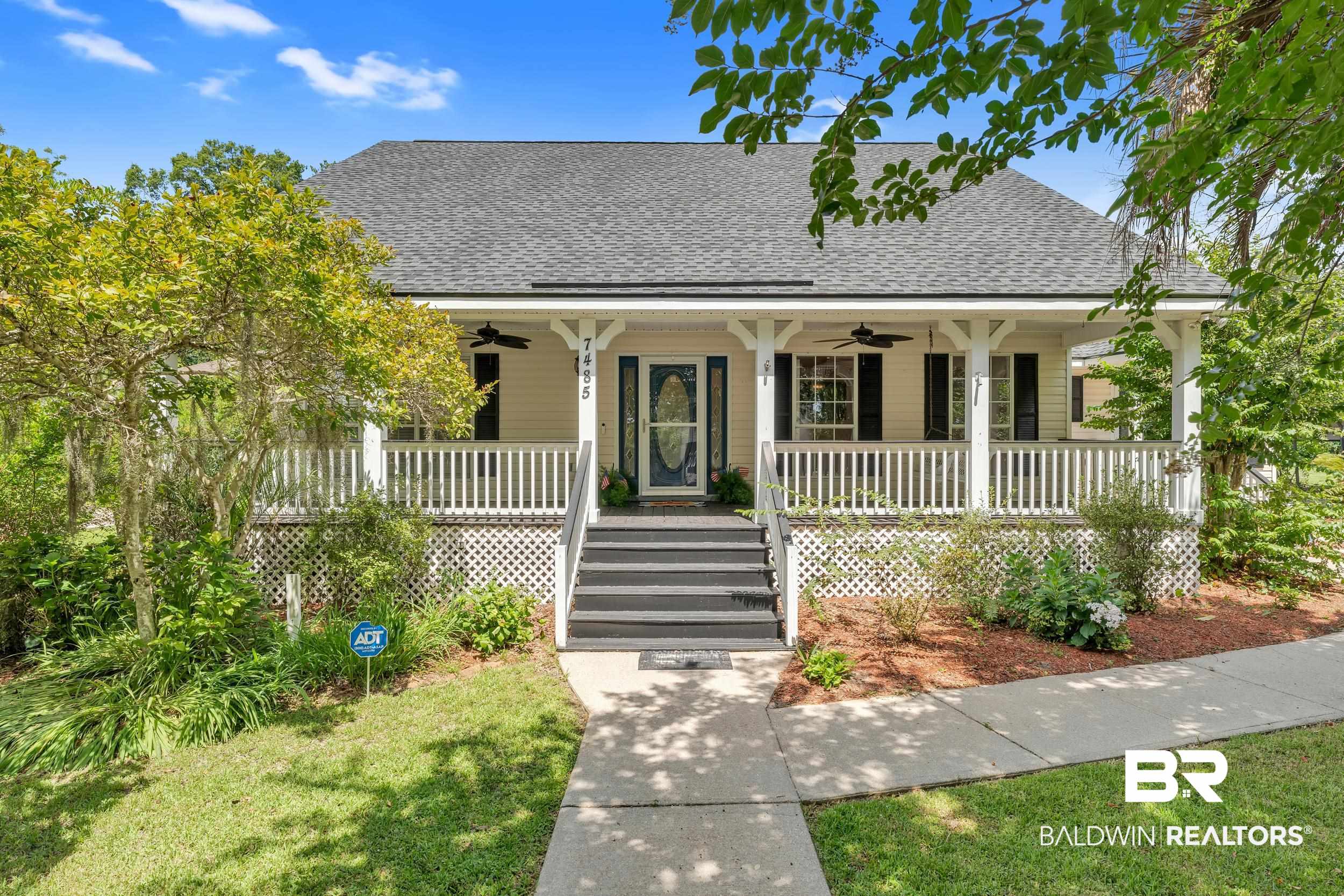 7485 Coopers Landing Road Foley, AL 36535 - Photo 1 of 20 View of front facade with ceiling fan, a porch, and roof with shingles