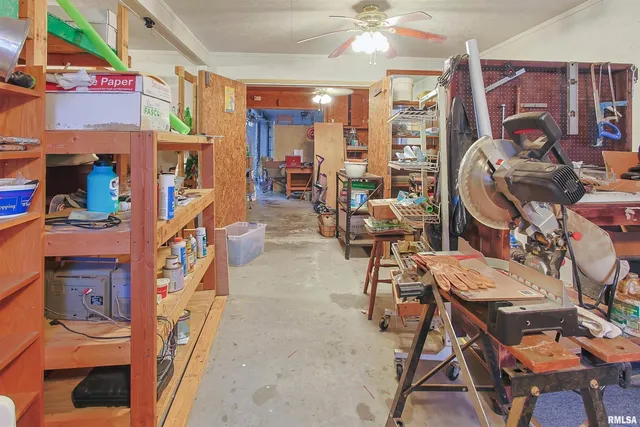 a view of a balcony with floor to ceiling windows with wooden floor