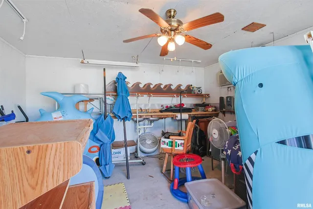 an aerial view of a residential houses with outdoor space and street view