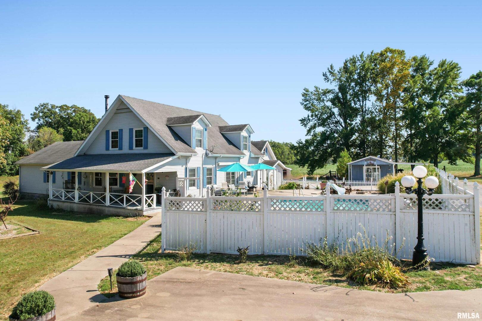 11939 Cochran Road Marion, IL 62959 - Photo 38 of 38 a front view of a house with a yard