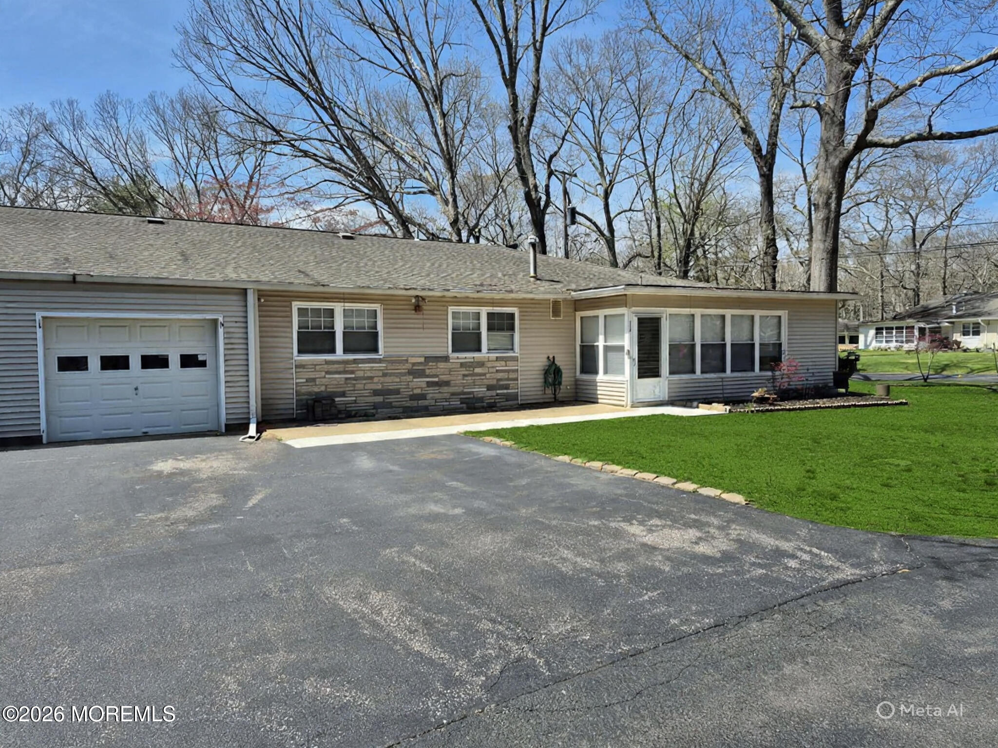 23 B E Road, Unit B Jackson, NJ 08527 - Photo 3 of 3 a house view with a garden space