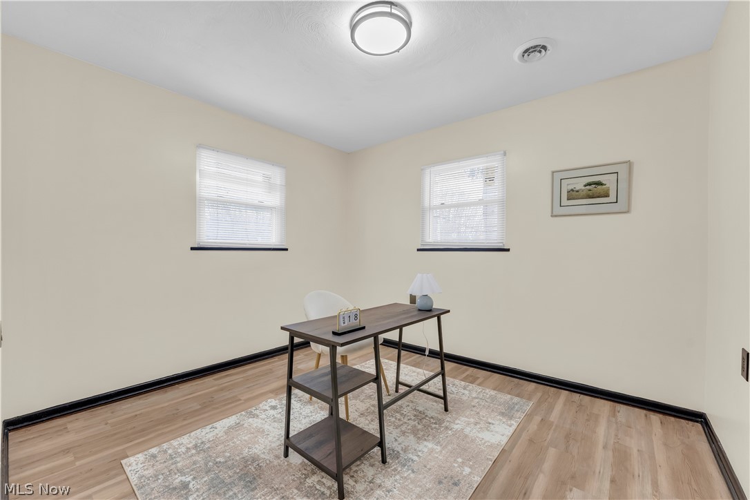 7320 Avon Belden Road North Ridgeville, OH 44039 - Photo 21 of 33 Home office featuring healthy amount of natural light and light wood finished floors