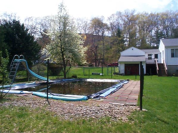 78 Bethany Road Framingham, MA 01702 - Photo 3 of 10 a front view of a house with a yard