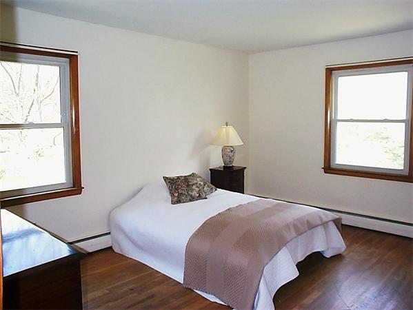 78 Bethany Road Framingham, MA 01702 - Photo 7 of 10 a bedroom with a bed and a window