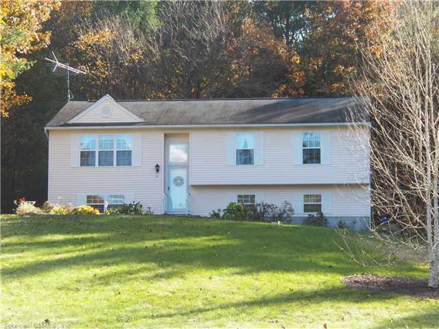 81 Picabo Street Killingly, CT 06239 - Photo 1 of 1 a front view of a house with a yard