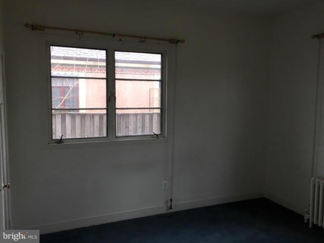 9904 Colesville Road Silver Spring, MD 20901 - Photo 16 of 23 an empty room with a window