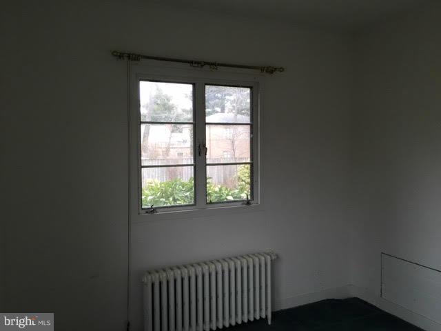 9904 Colesville Road Silver Spring, MD 20901 - Photo 17 of 23 a view of a room that has a window in it