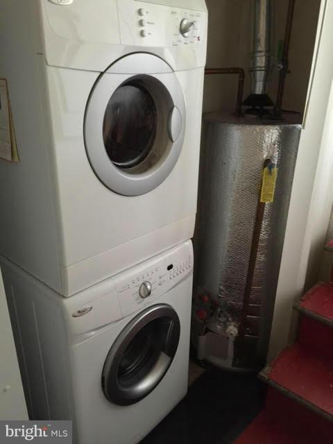 9904 Colesville Road Silver Spring, MD 20901 - Photo 23 of 23 a utility room with dryer and washer