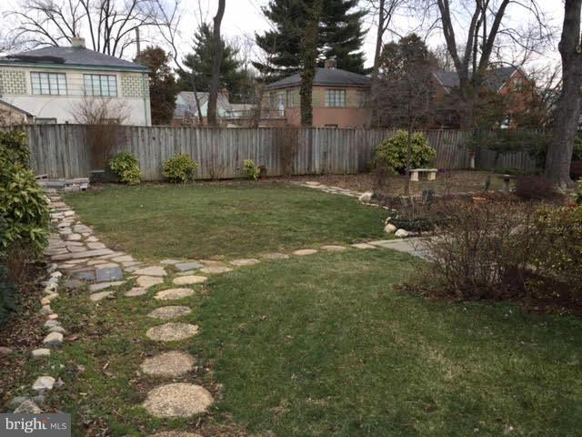 9904 Colesville Road Silver Spring, MD 20901 - Photo 4 of 23 a backyard of a house with lots of green space