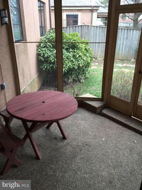 9904 Colesville Road Silver Spring, MD 20901 - Photo 6 of 23 a view of a porch with furniture and yard floor