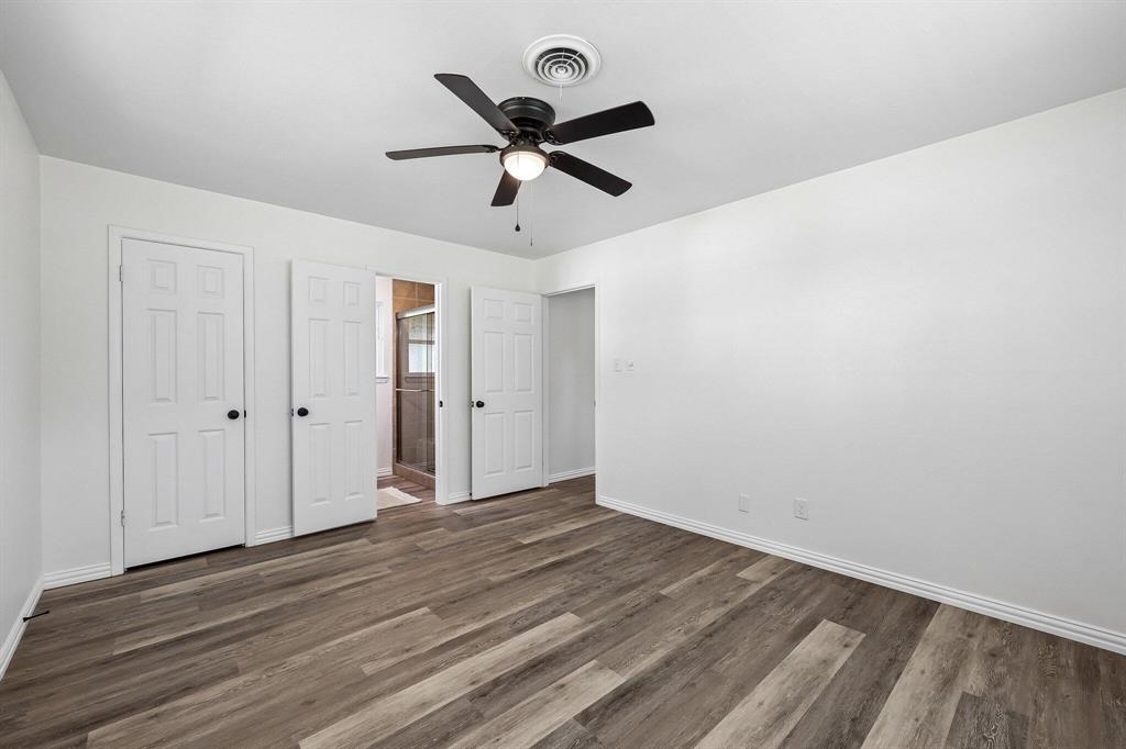 913 North Main Street Springtown, TX 76082 - Photo 16 of 25 a view of empty room with wooden floor