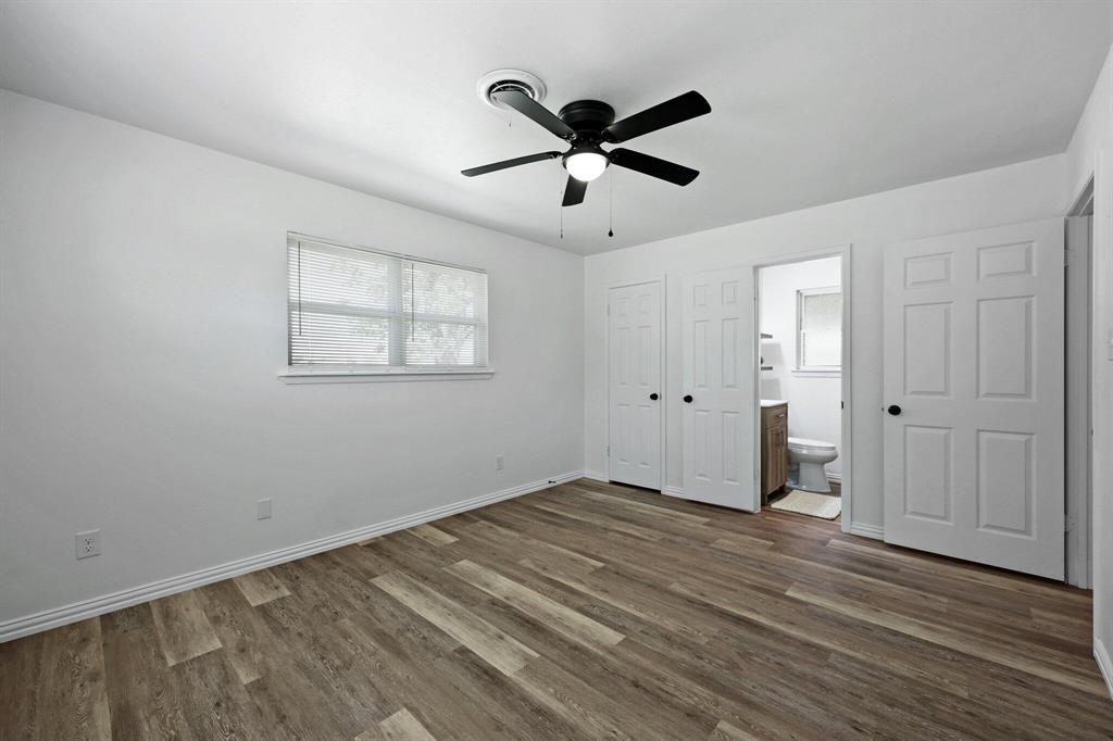 913 North Main Street Springtown, TX 76082 - Photo 17 of 25 a view of empty room with wooden floor