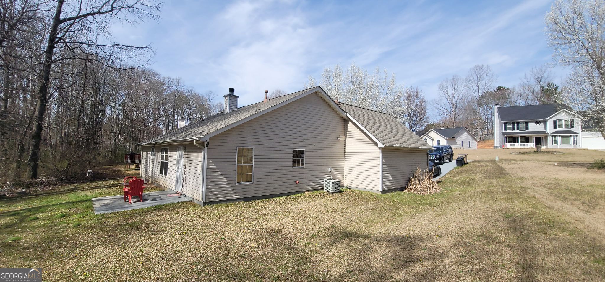 10282 Commons Crossing Jonesboro, GA 30238 - Photo 2 of 3 a view of a house with a yard