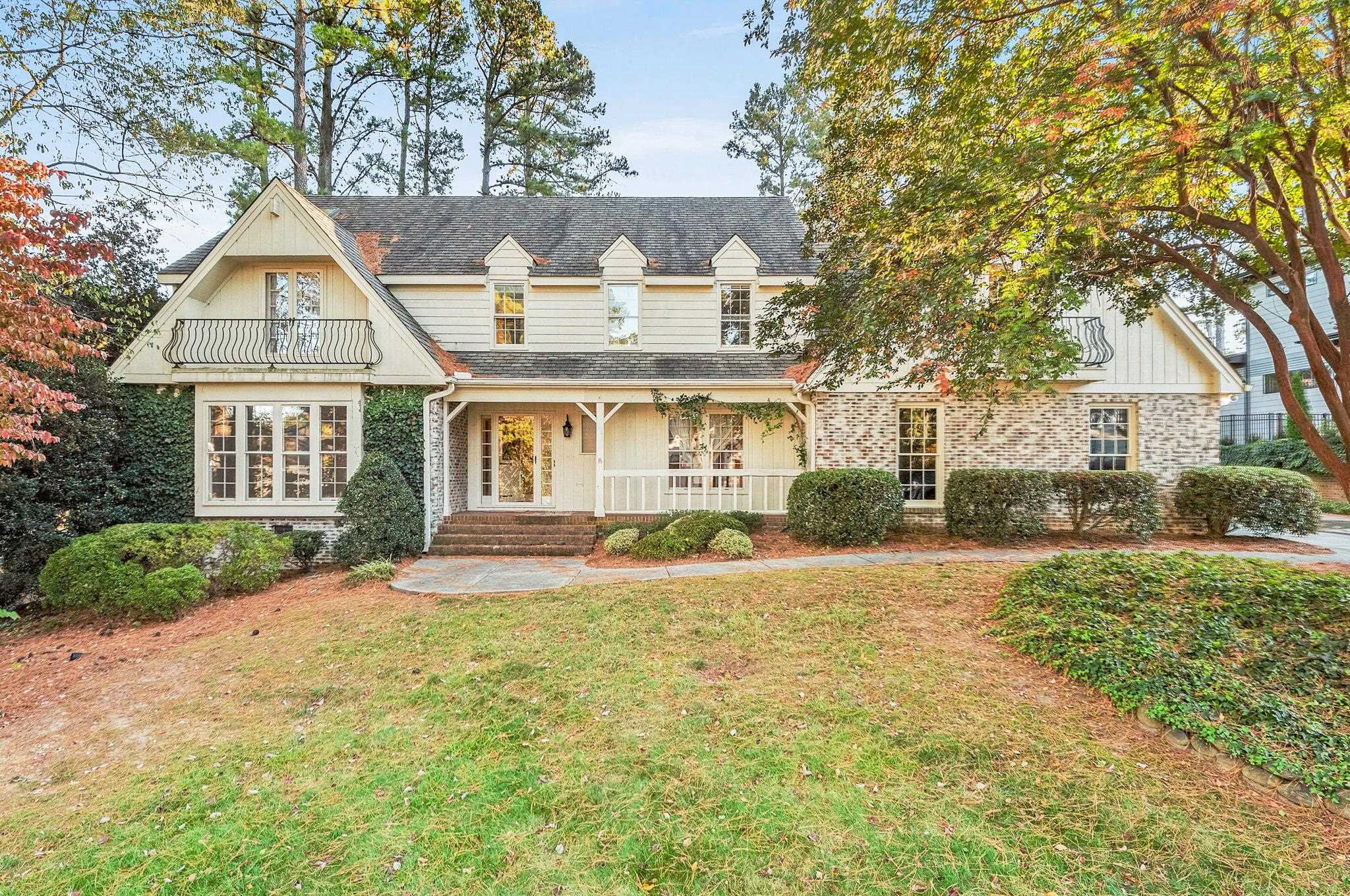 1704 Hunting Ridge Road Raleigh, NC 27615 - Photo 1 of 43 front view of a house with a yard