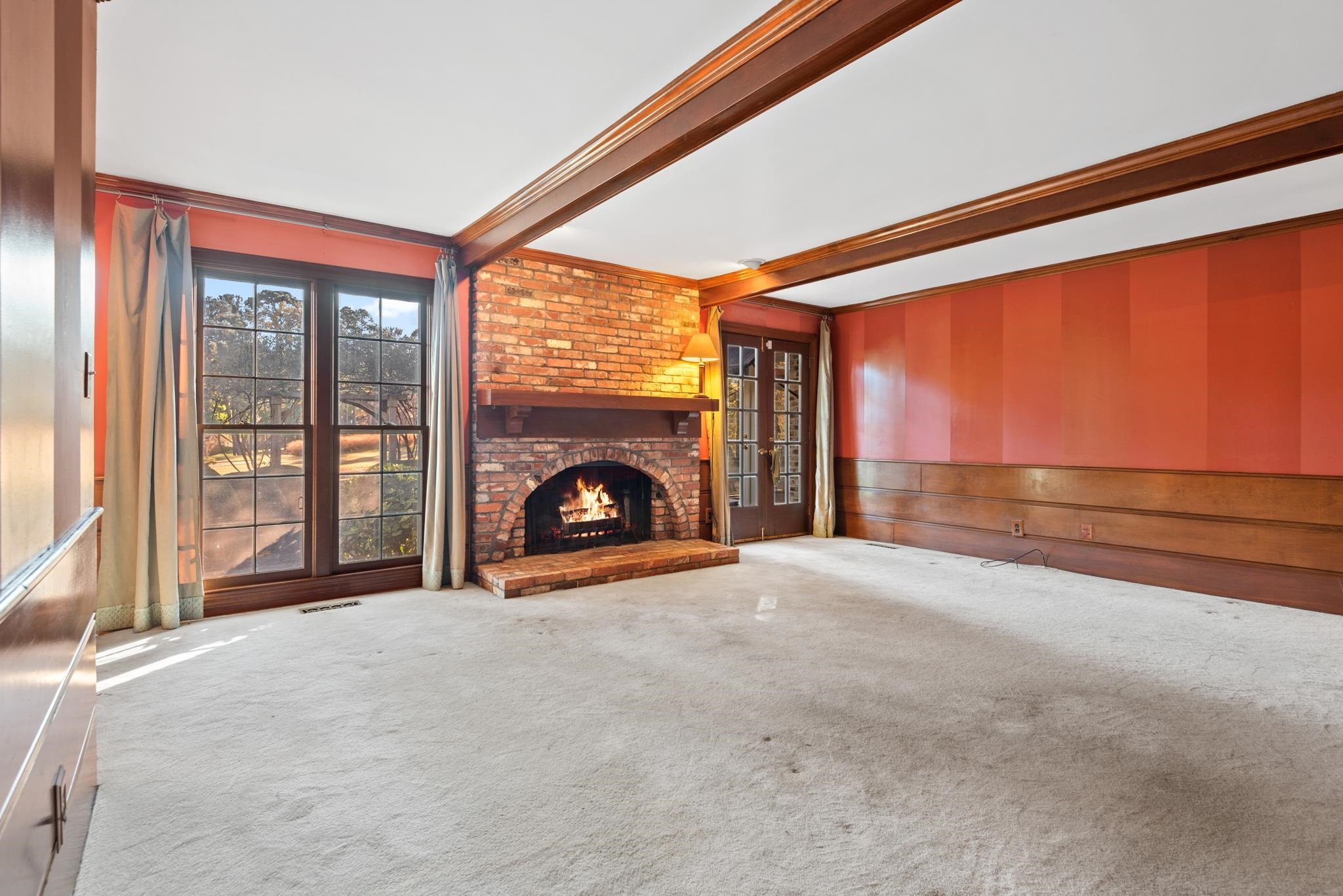 1704 Hunting Ridge Road Raleigh, NC 27615 - Photo 14 of 43 a view of empty room with a fireplace