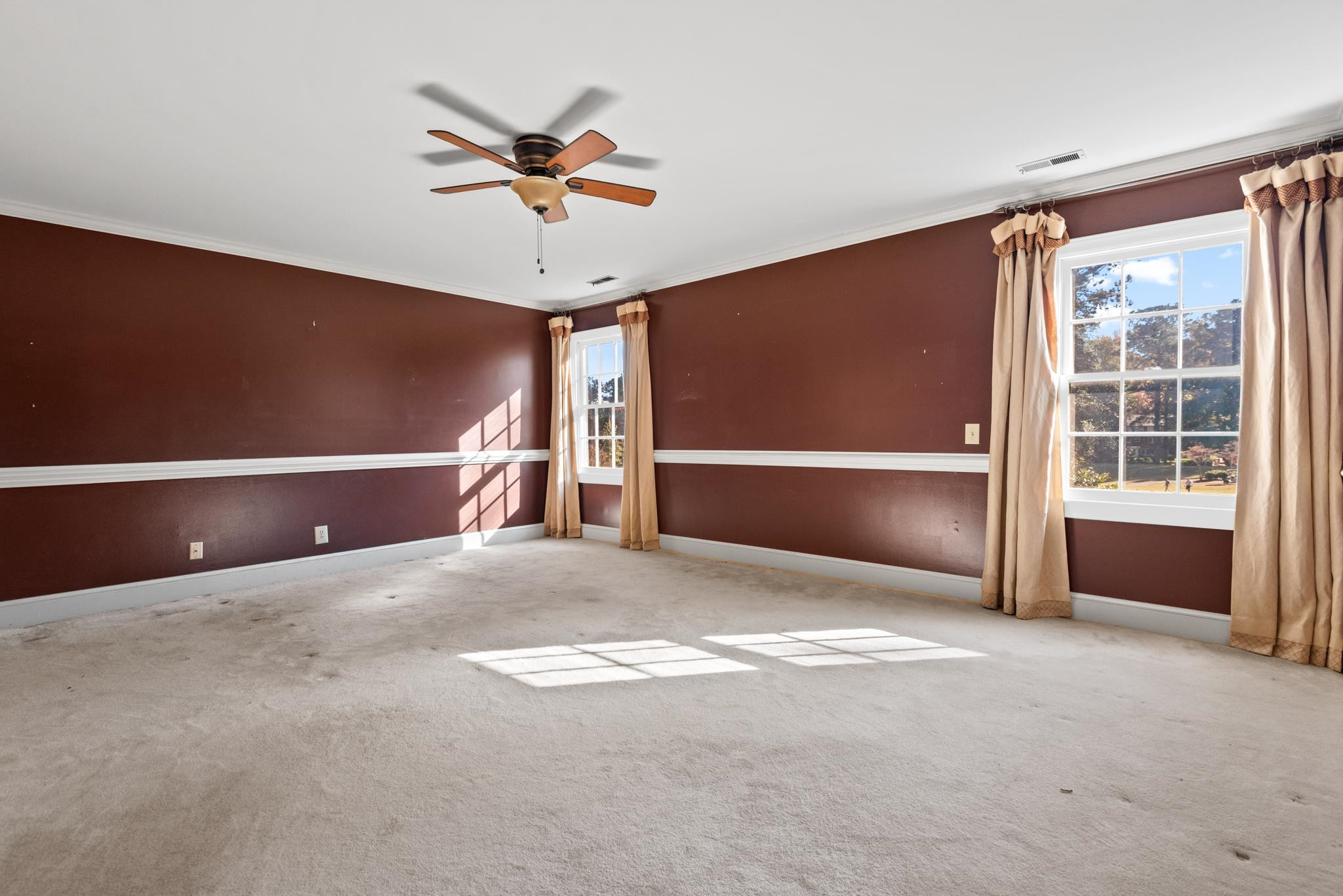 1704 Hunting Ridge Road Raleigh, NC 27615 - Photo 22 of 43 a view of an empty room with a window