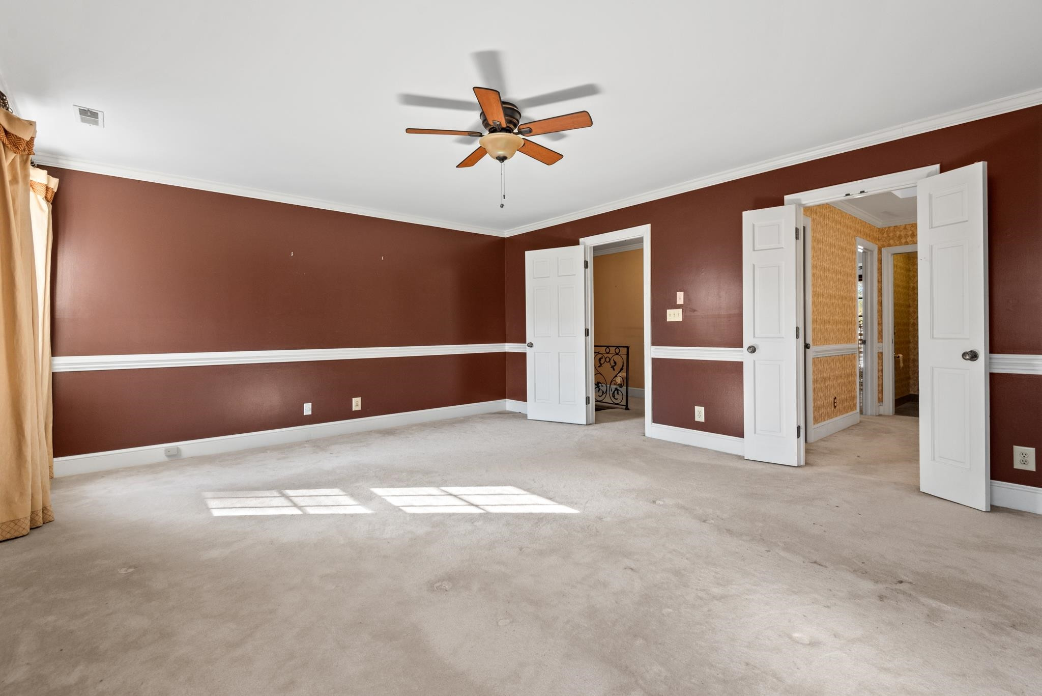 1704 Hunting Ridge Road Raleigh, NC 27615 - Photo 23 of 43 an empty room with closet and windows
