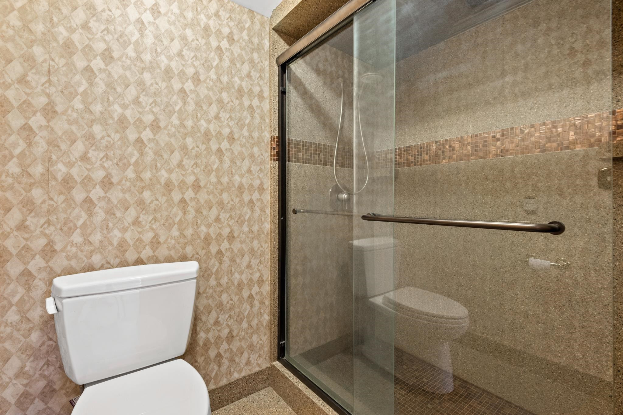 1704 Hunting Ridge Road Raleigh, NC 27615 - Photo 25 of 43 a white toilet sitting next to a shower
