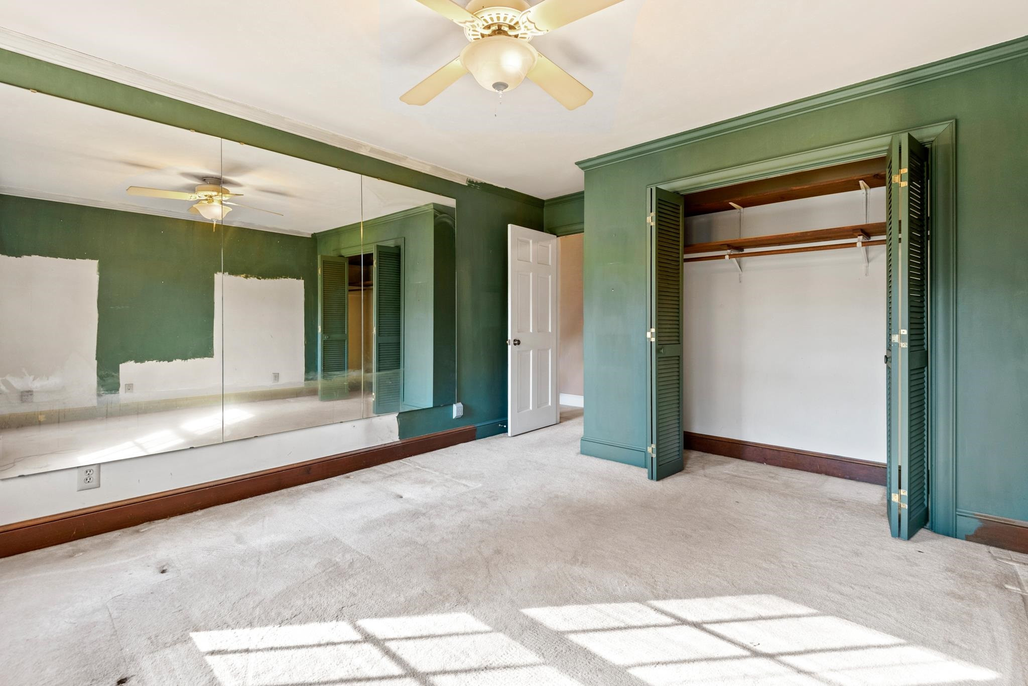 1704 Hunting Ridge Road Raleigh, NC 27615 - Photo 30 of 43 a view of a hallway with a chandelier