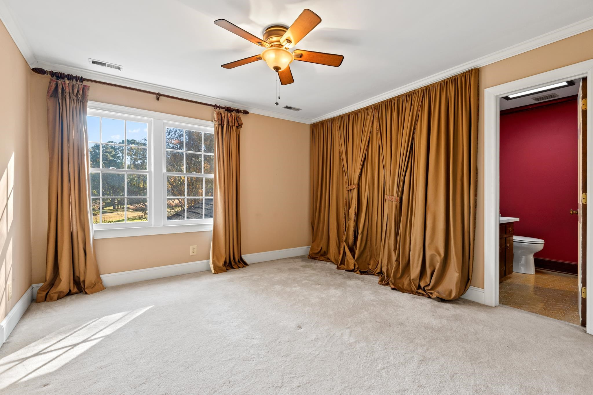 1704 Hunting Ridge Road Raleigh, NC 27615 - Photo 32 of 43 an empty room with windows and closet