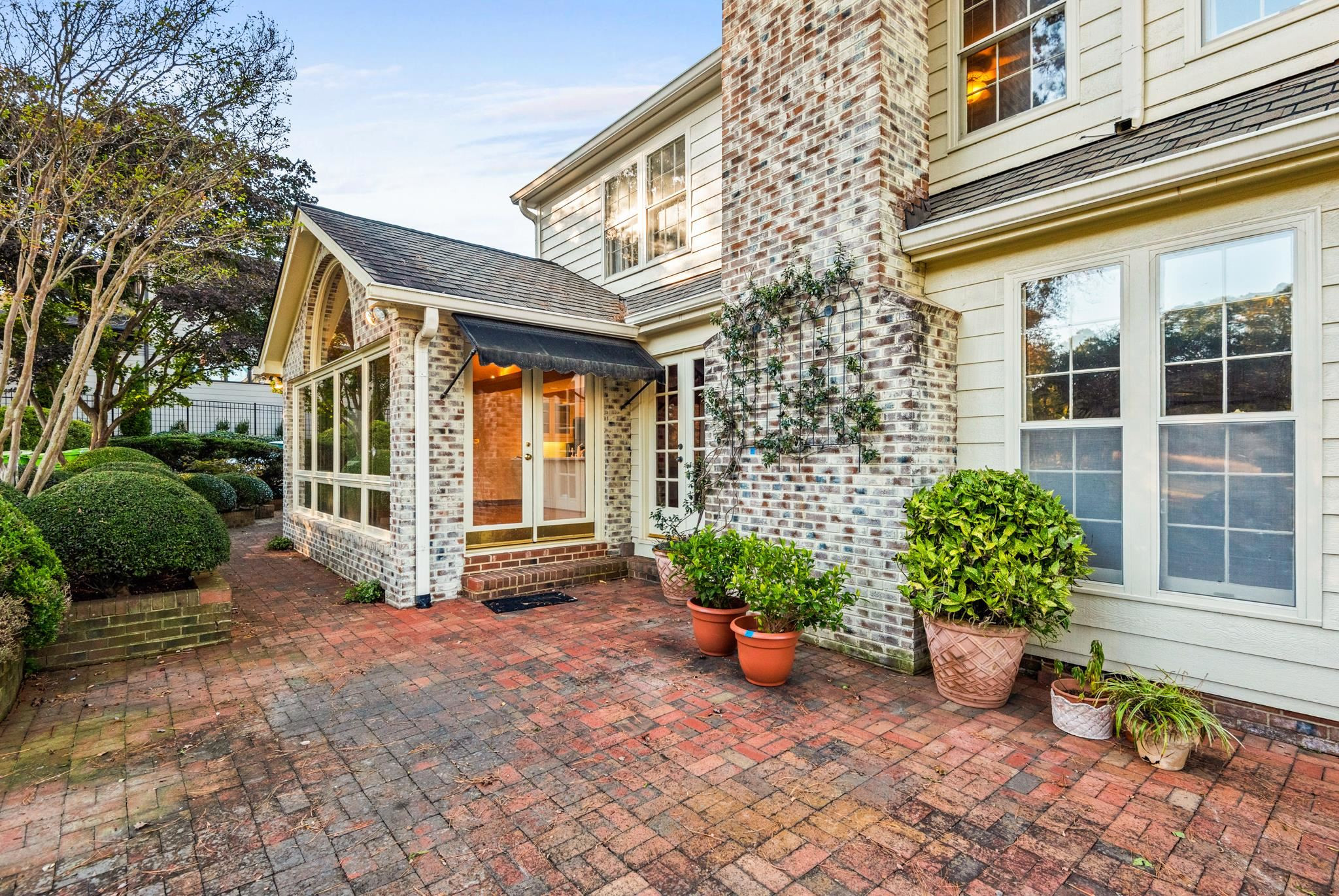 1704 Hunting Ridge Road Raleigh, NC 27615 - Photo 40 of 43 a view of a house with potted plants