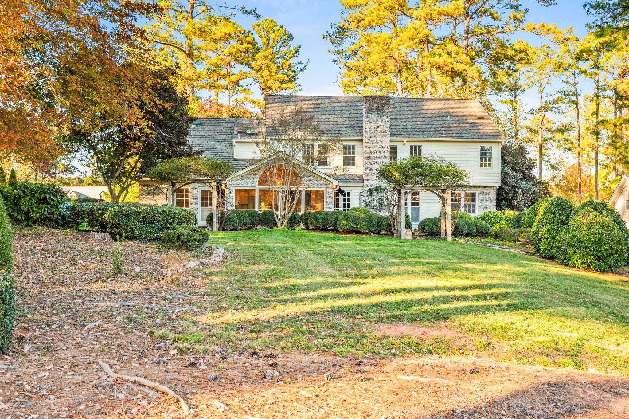 1704 Hunting Ridge Road Raleigh, NC 27615 - Photo 43 of 43 a view of a house with a yard and a garage