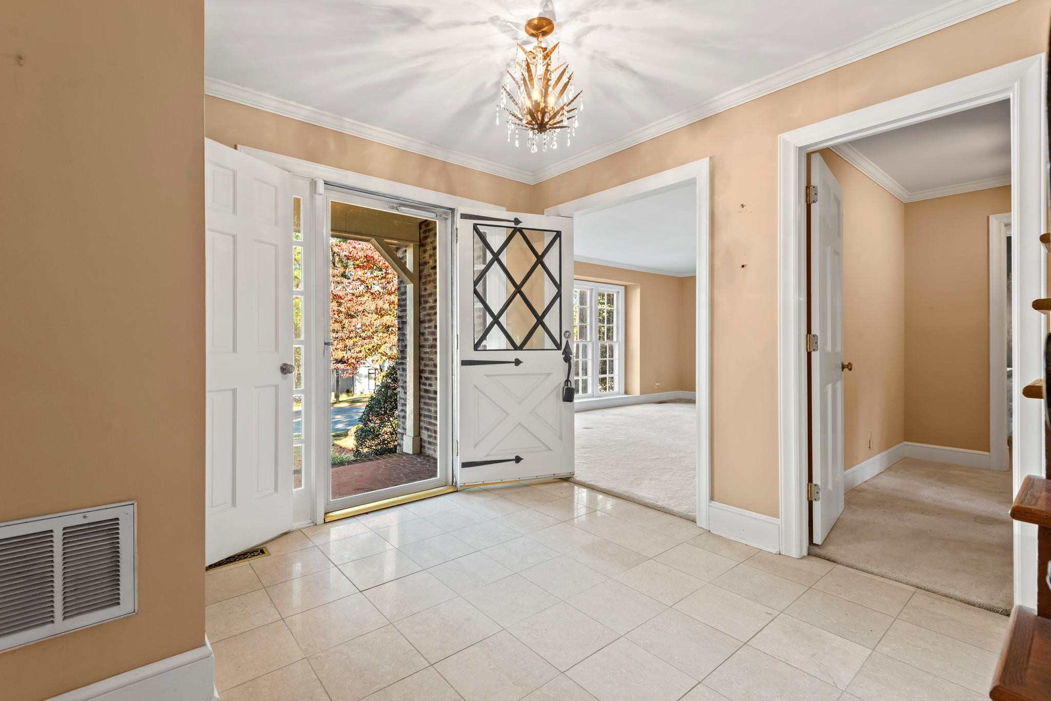1704 Hunting Ridge Road Raleigh, NC 27615 - Photo 5 of 43 a view of a livingroom with wooden floor and windows
