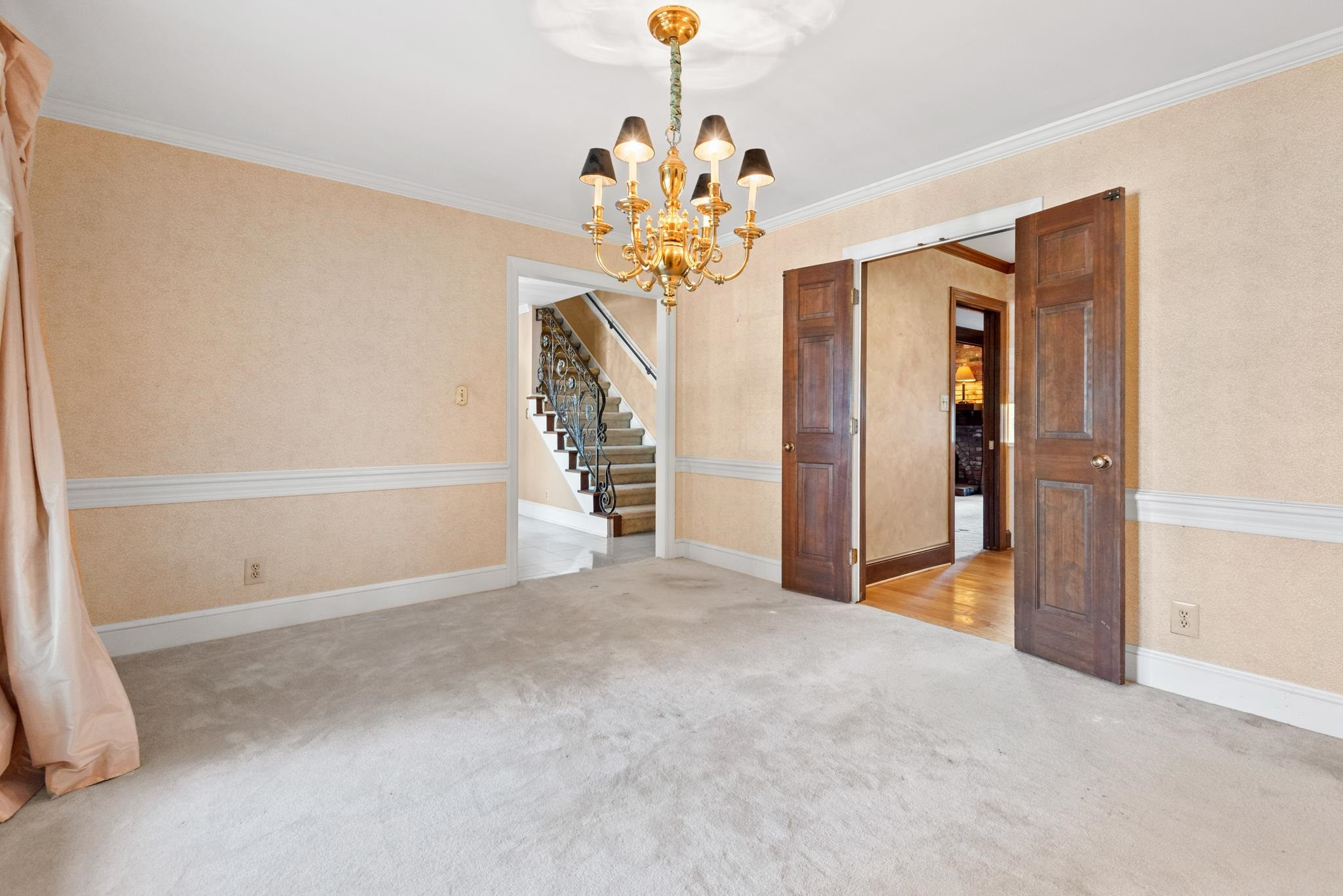 1704 Hunting Ridge Road Raleigh, NC 27615 - Photo 9 of 43 a view of an empty room with a window