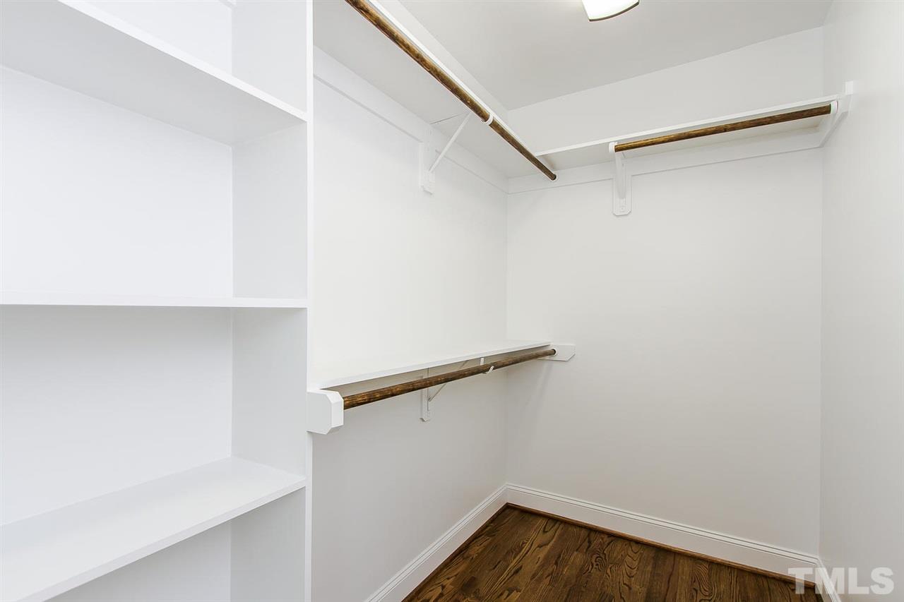 721 South State Street Raleigh, NC 27601 - Photo 16 of 25 a view of walk in closet with empty racks