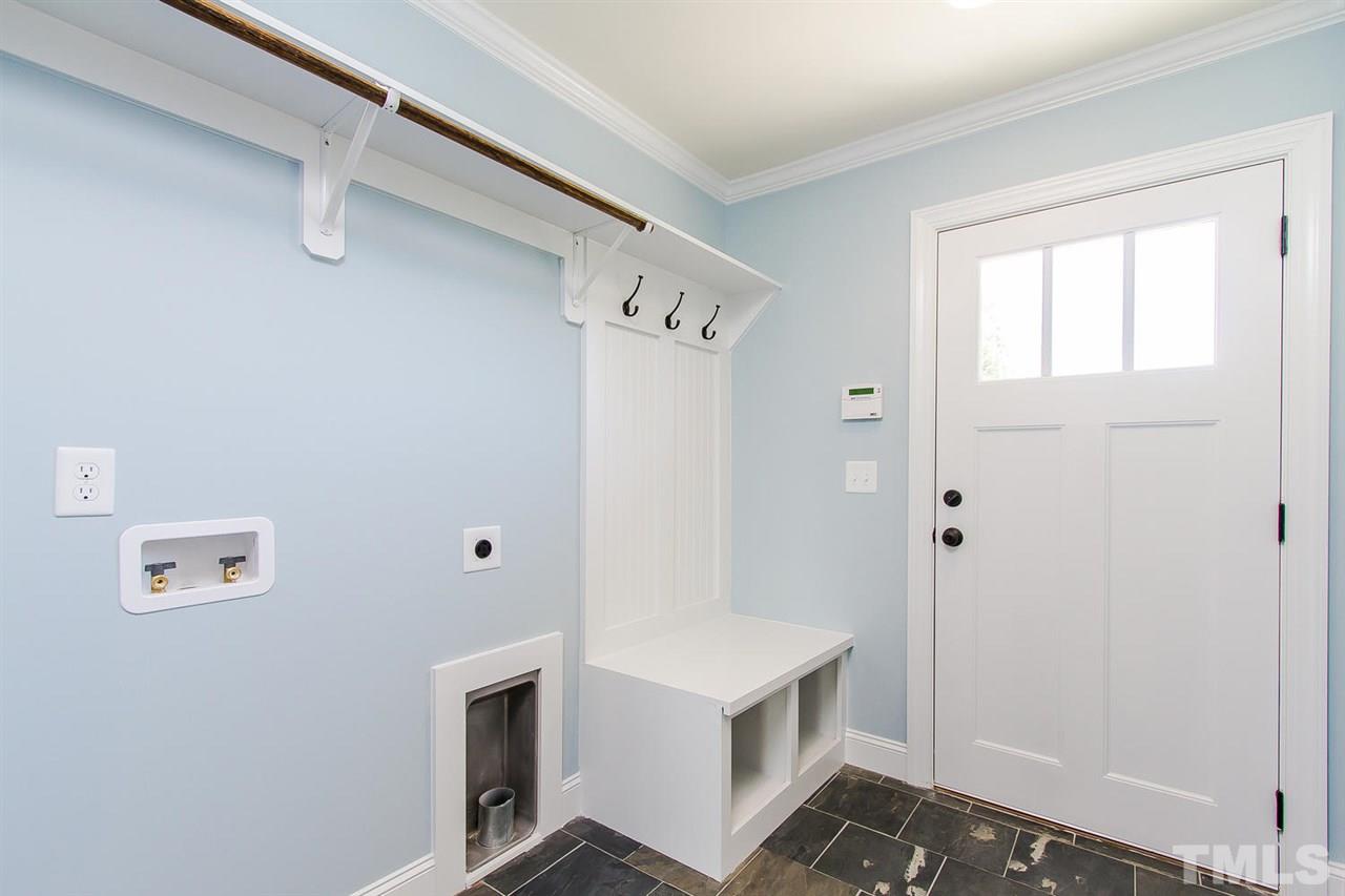 721 South State Street Raleigh, NC 27601 - Photo 18 of 25 a bathroom with a sink a toilet and shower