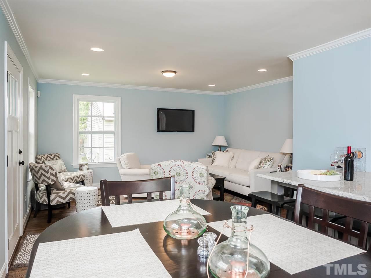 721 South State Street Raleigh, NC 27601 - Photo 4 of 25 a living room with furniture window and a table