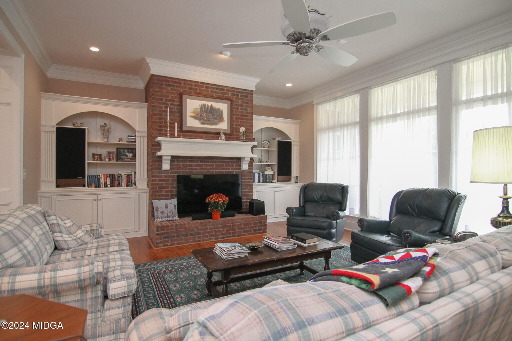 226 Walton Chase Perry, GA 31069 - Photo 11 of 46 a living room with furniture fireplace and window