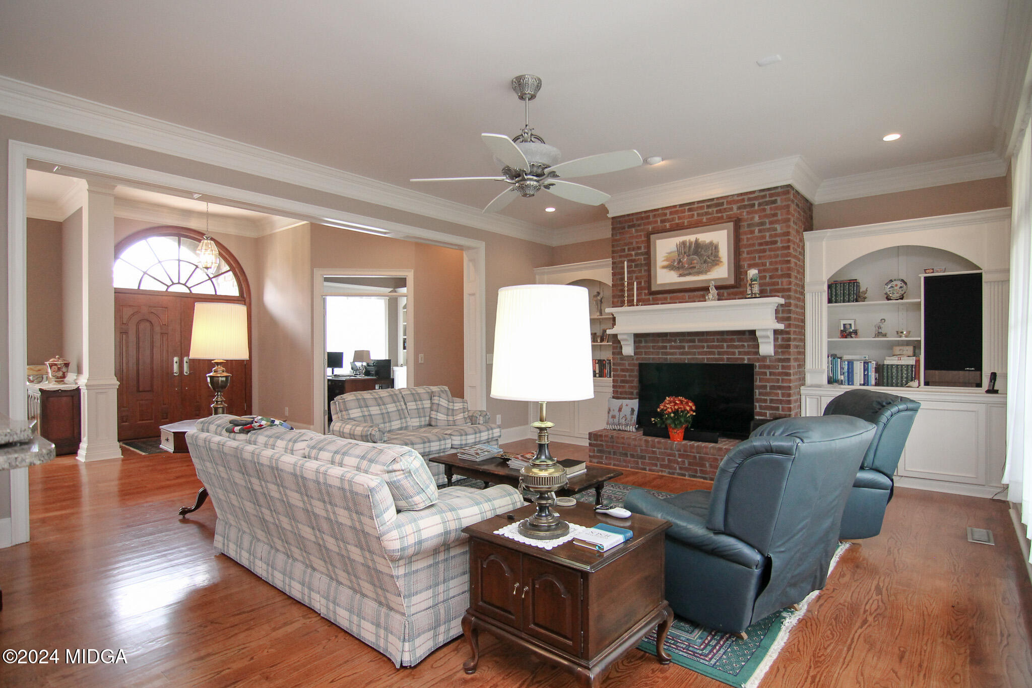 226 Walton Chase Perry, GA 31069 - Photo 12 of 46 a living room with furniture fireplace and window
