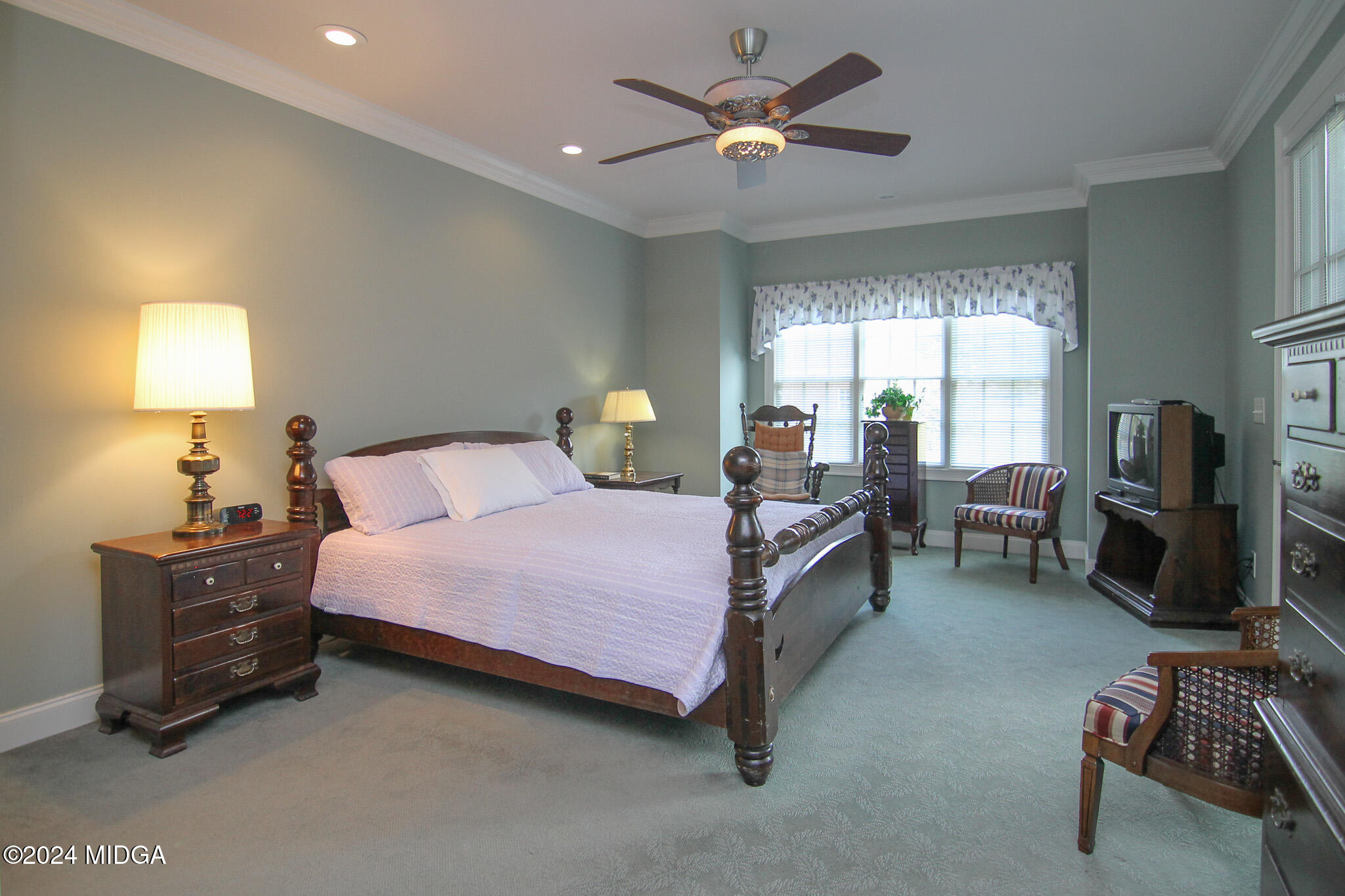 226 Walton Chase Perry, GA 31069 - Photo 18 of 46 a bedroom with a bed gym equipment and a window