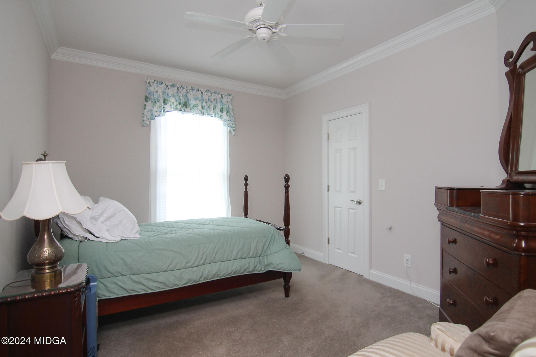 226 Walton Chase Perry, GA 31069 - Photo 31 of 46 a bedroom with a bed and a window