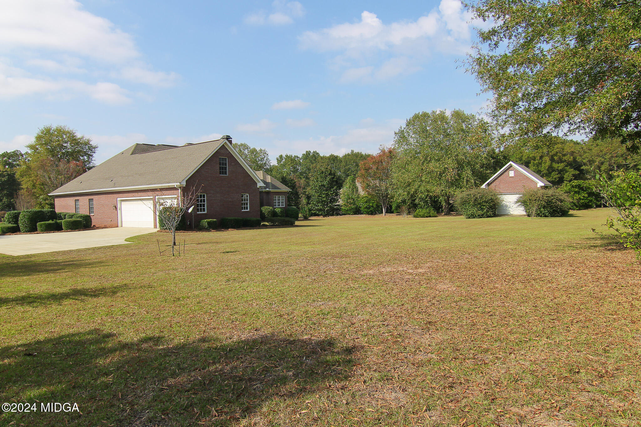 226 Walton Chase Perry, GA 31069 - Photo 40 of 46 a view of house with yard and trees in the background