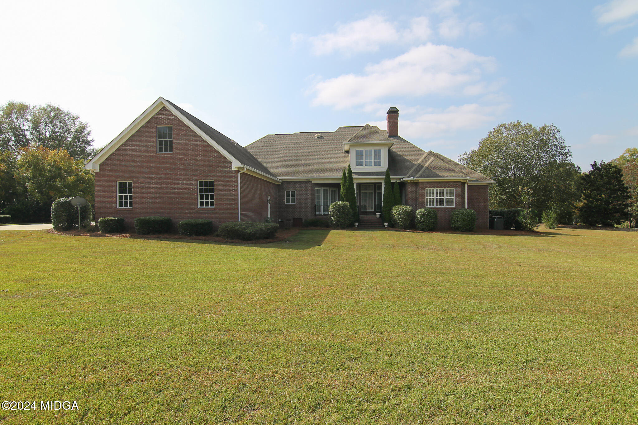 226 Walton Chase Perry, GA 31069 - Photo 44 of 46 a front view of a house with a yard