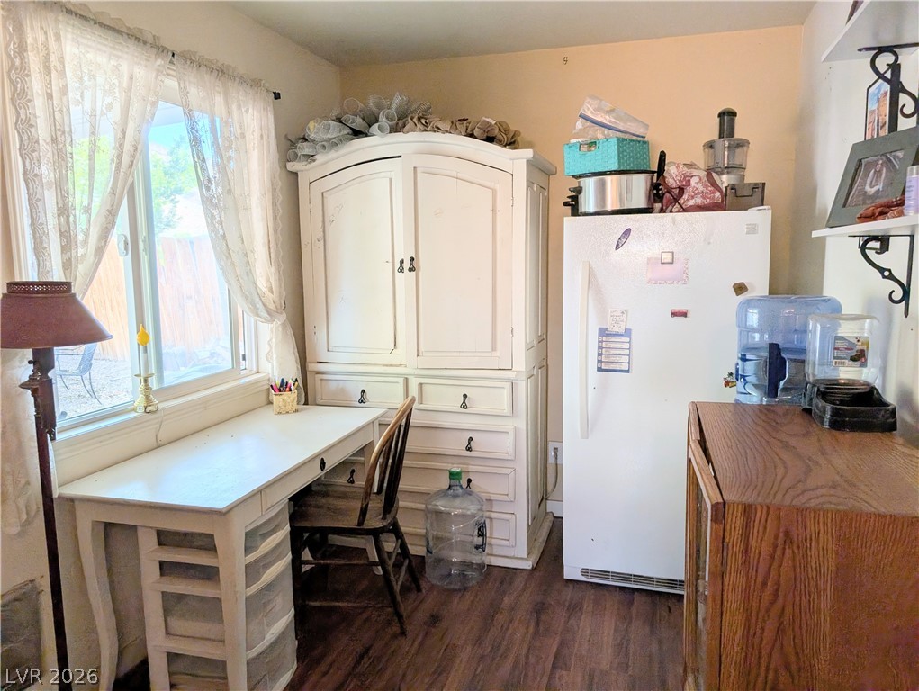 107 Rowan Drive Caliente, NV 89008 - Photo 14 of 23 This versatile space offers a functional desk area, closet and hardwood flooring.