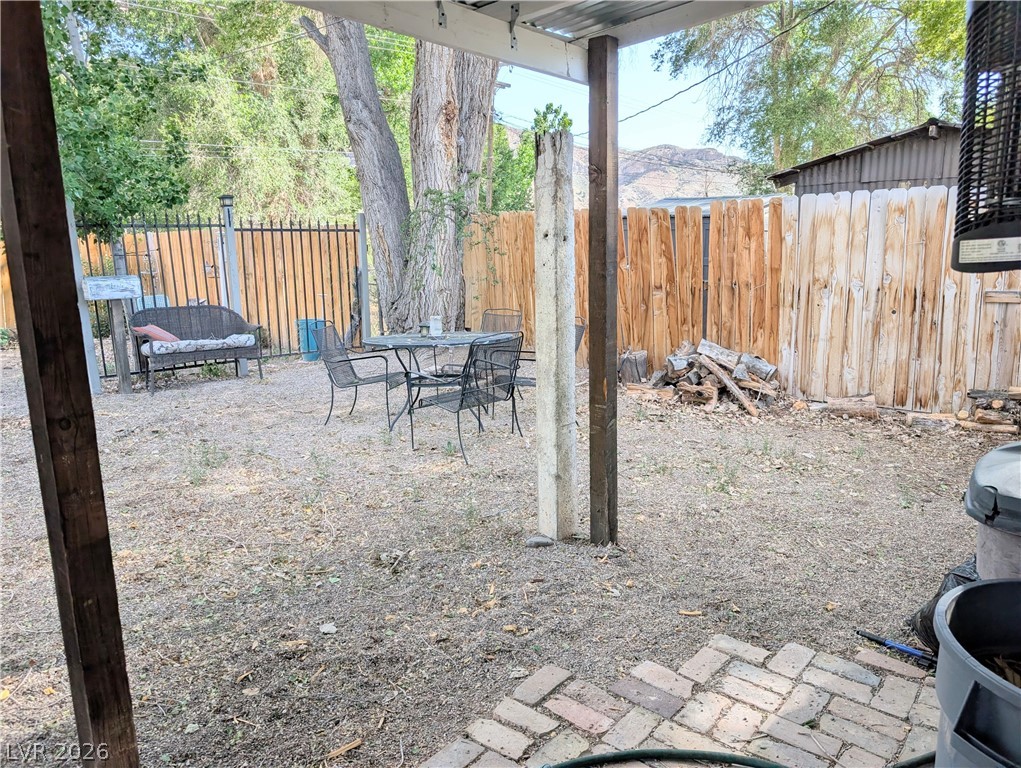 107 Rowan Drive Caliente, NV 89008 - Photo 17 of 23 This spacious yard offers ample room for outdoor activities and future landscaping visions.