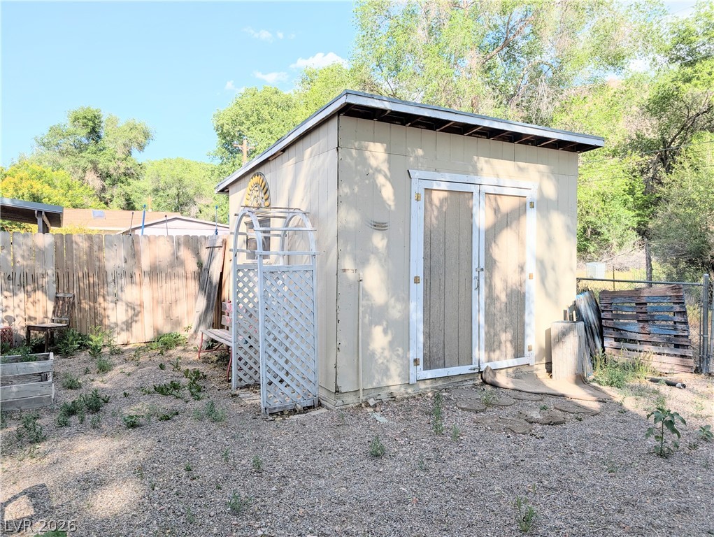 107 Rowan Drive Caliente, NV 89008 - Photo 18 of 23 This outdoor shed offers practical storage and adds to the property's utility.