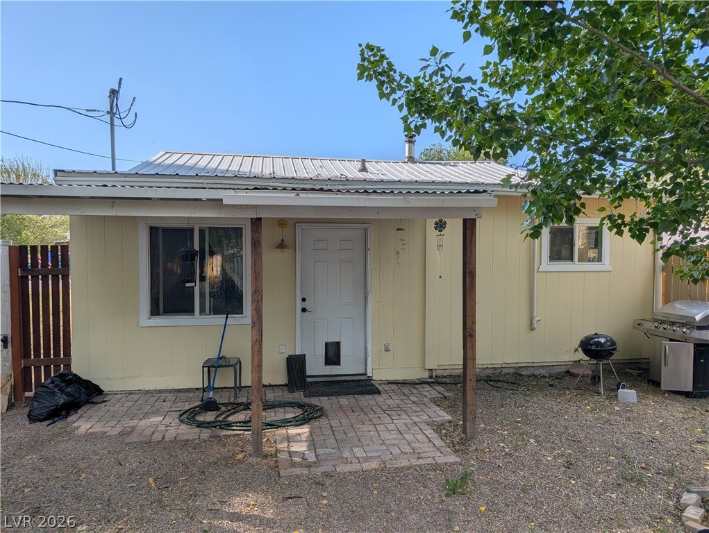107 Rowan Drive Caliente, NV 89008 - Photo 21 of 23 This charming home offers a welcoming exterior with a quaint patio area.
