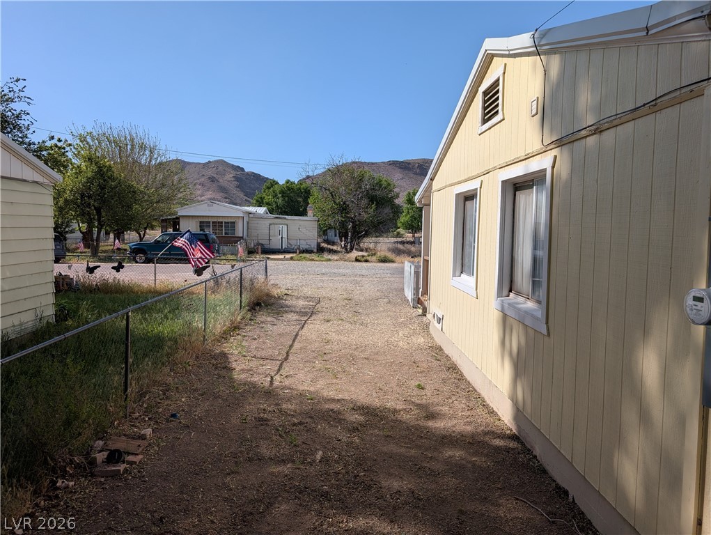 107 Rowan Drive Caliente, NV 89008 - Photo 22 of 23 This charming home offers a cozy retreat with a classic design and inviting exterior.