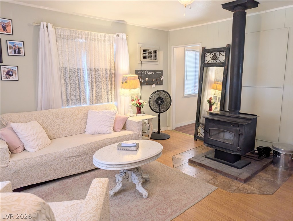 107 Rowan Drive Caliente, NV 89008 - Photo 3 of 23 This living room features a cozy fireplace, perfect for relaxing evenings.