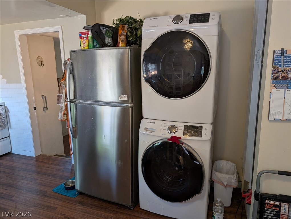 107 Rowan Drive Caliente, NV 89008 - Photo 9 of 23 Functional laundry area featuring modern appliances and durable flooring for everyday convenience.