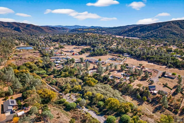 a view of road with houses