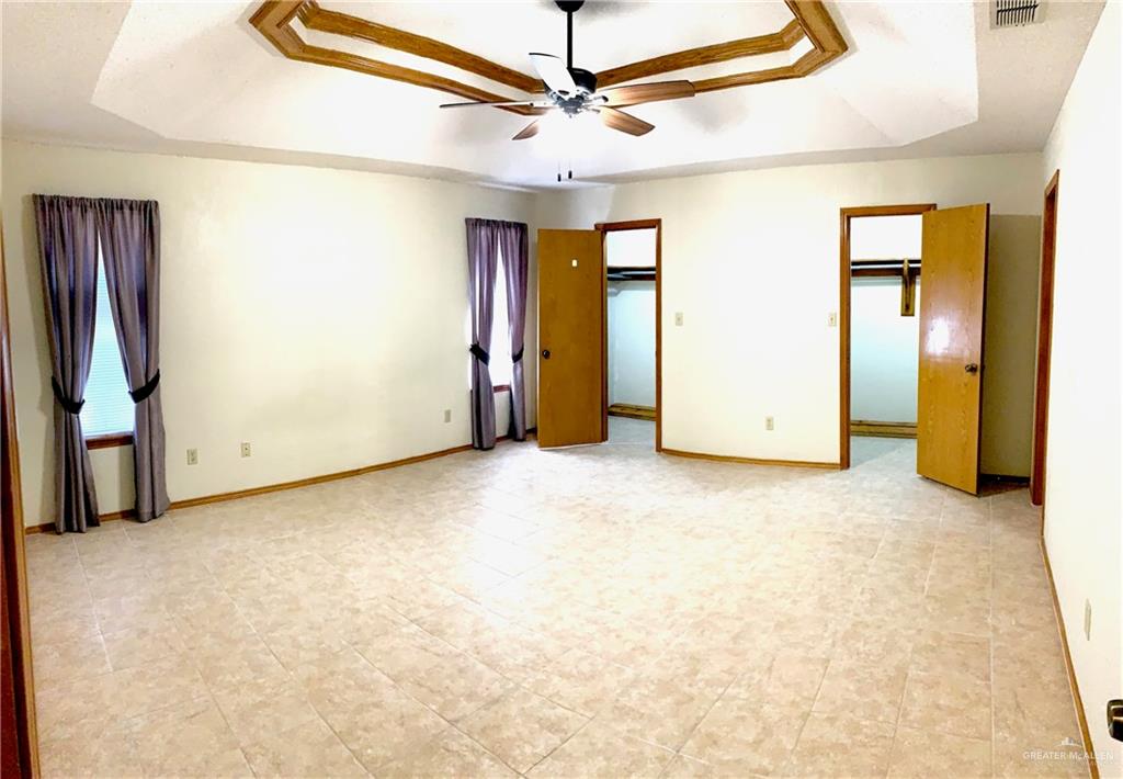 1311 East Pine Avenue Pharr, TX 78577 - Photo 12 of 14 a view of a room with painted walls