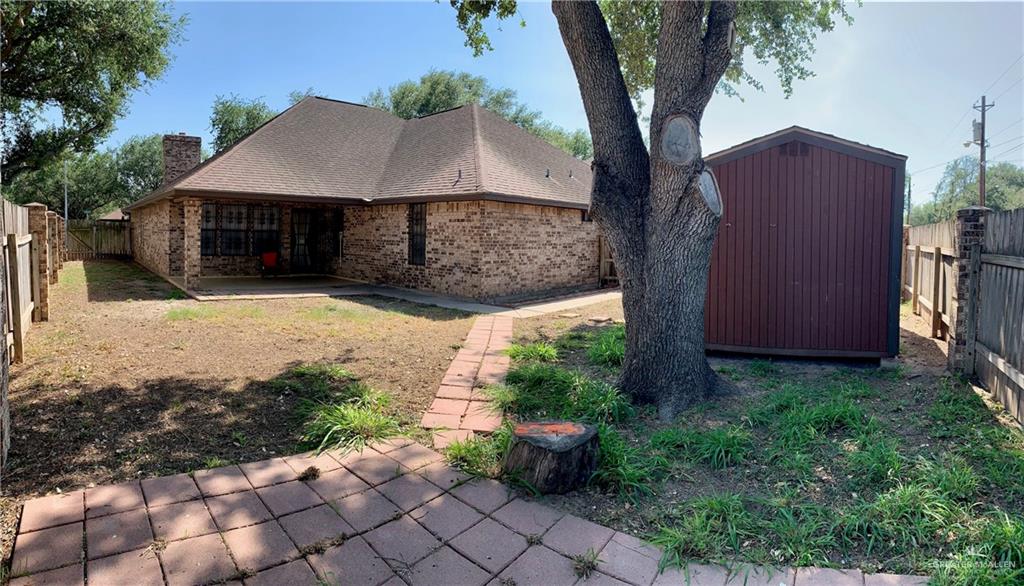 1311 East Pine Avenue Pharr, TX 78577 - Photo 14 of 14 a front view of a house with garden