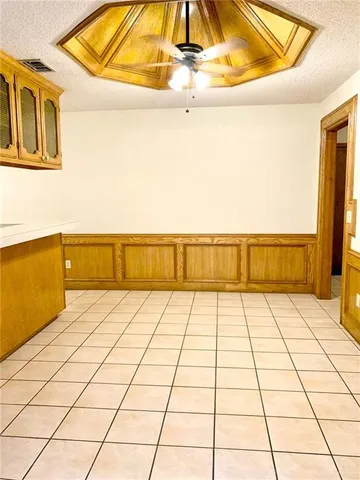 a view of a room with rack and wooden floor