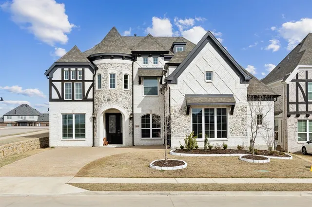 a front view of a house with a porch